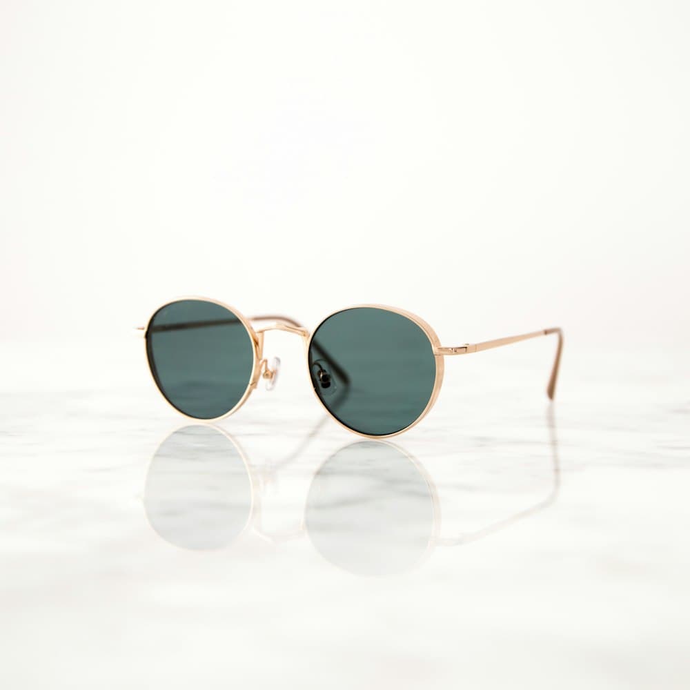 Sunglasses arranged on a boutique shelf